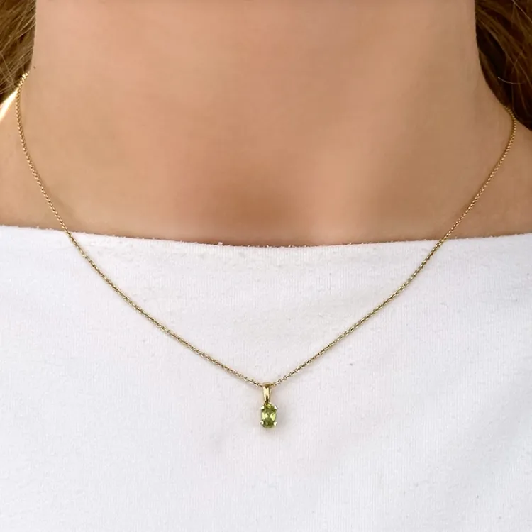 peridot hängen i 14  carat guld
