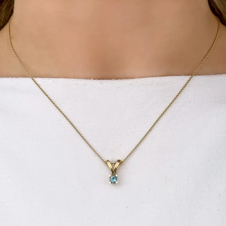 topas guldberlocker i 14  carat guld 0,22 ct