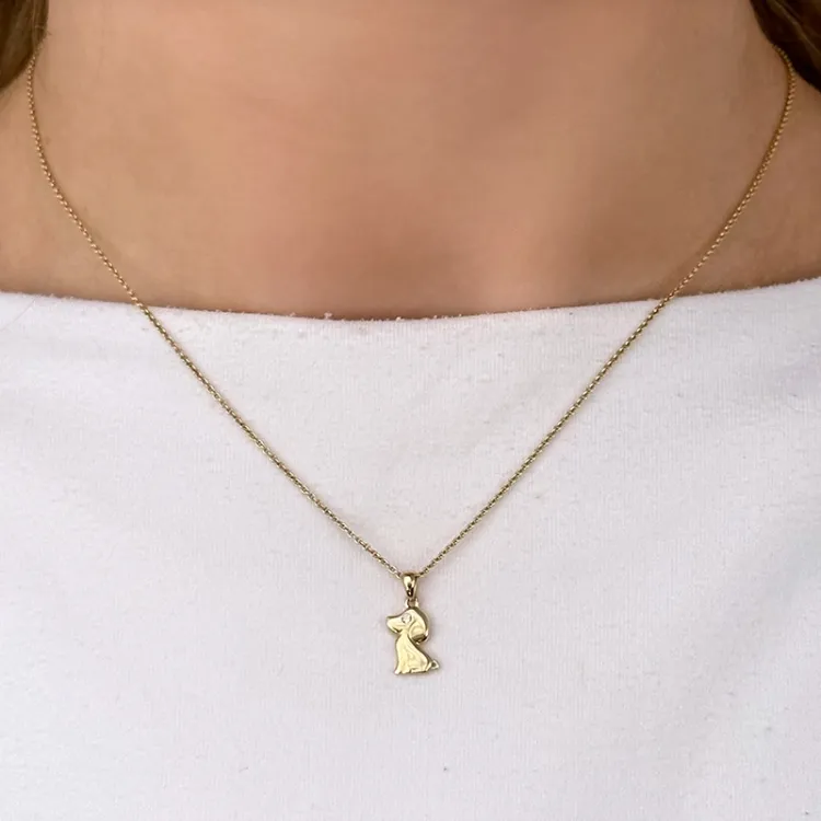 hundar diamantberlocker i 14  carat guld 0,01 ct