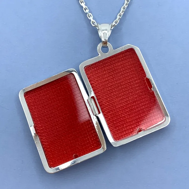 medaljong i silver