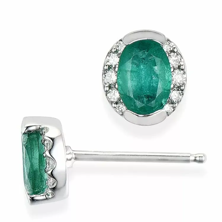 ovala smaragd örhängestift i 14 karat vitguld med diamant och smaragd