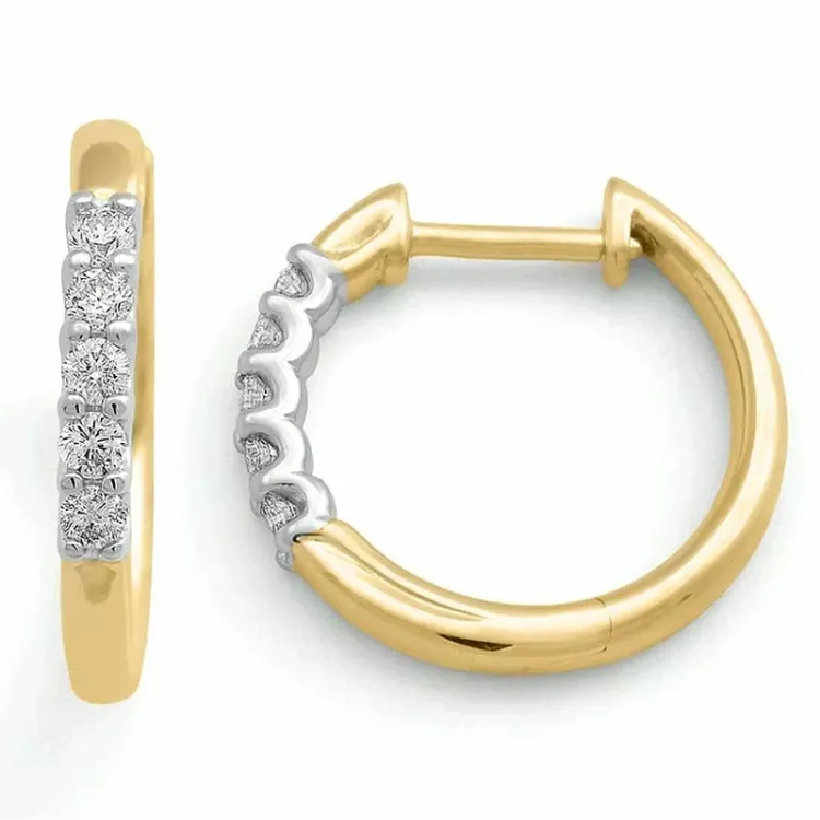 16 mm creol i 14 karat guld och vitguld med diamant
