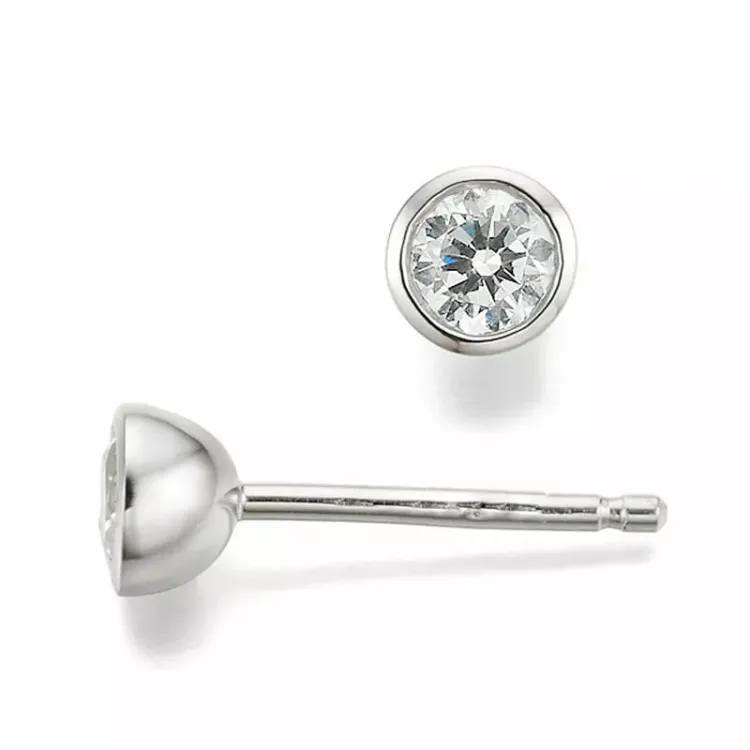 runda diamant solitäreörhängestift i 14 karat vitguld med diamant