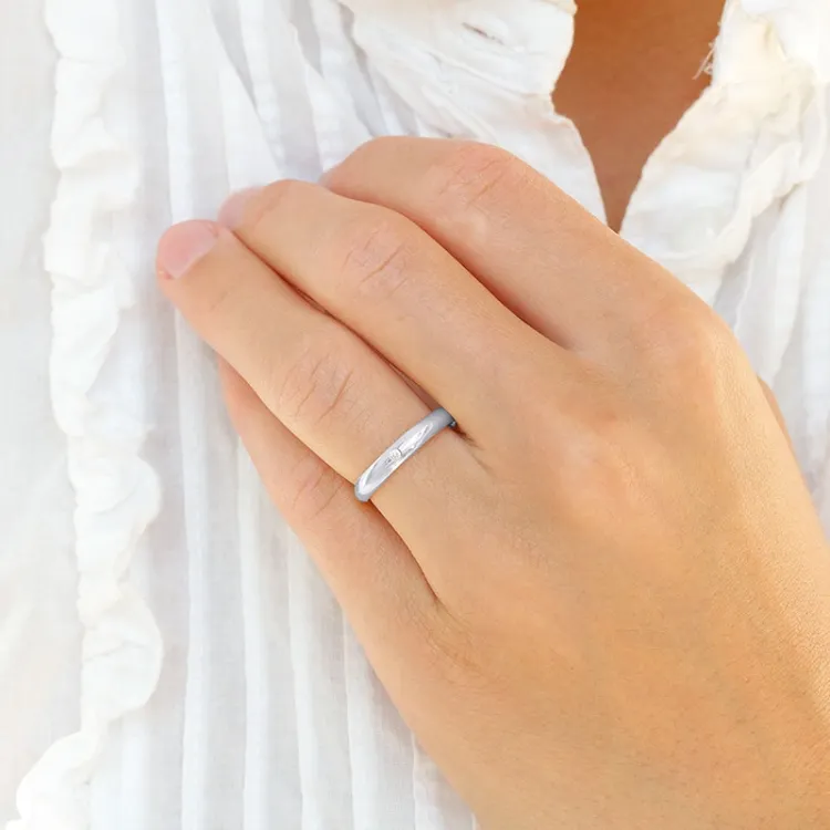 4 och 3 mm vigselsringar i 9 karat vitguld 0,02 ct - set