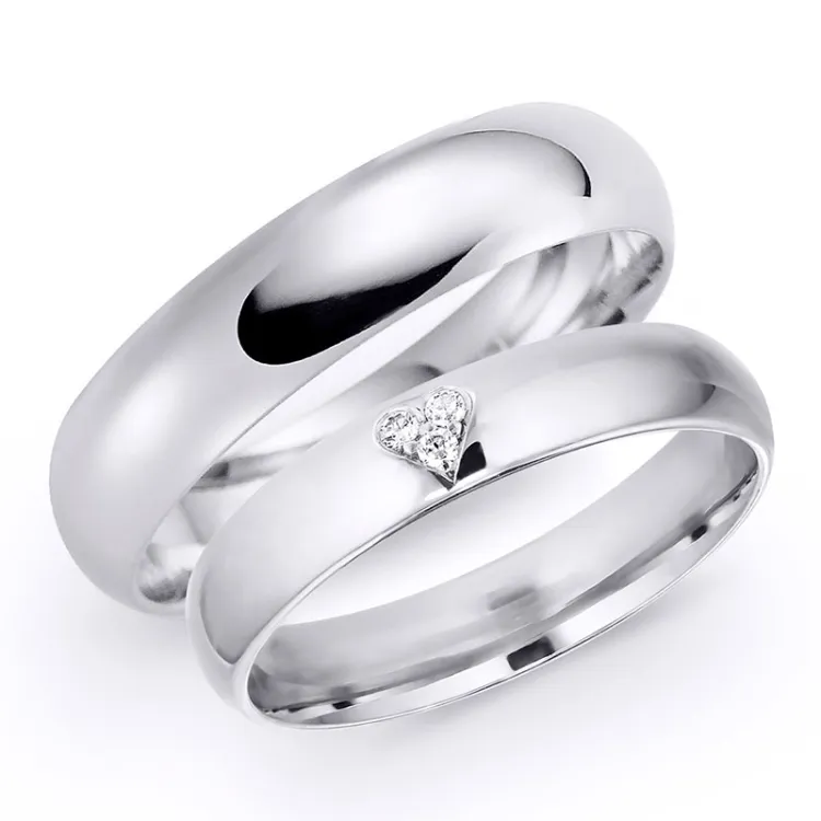 5 och 4 mm vigselsringar i 9 karat vitguld 0,03 ct - set