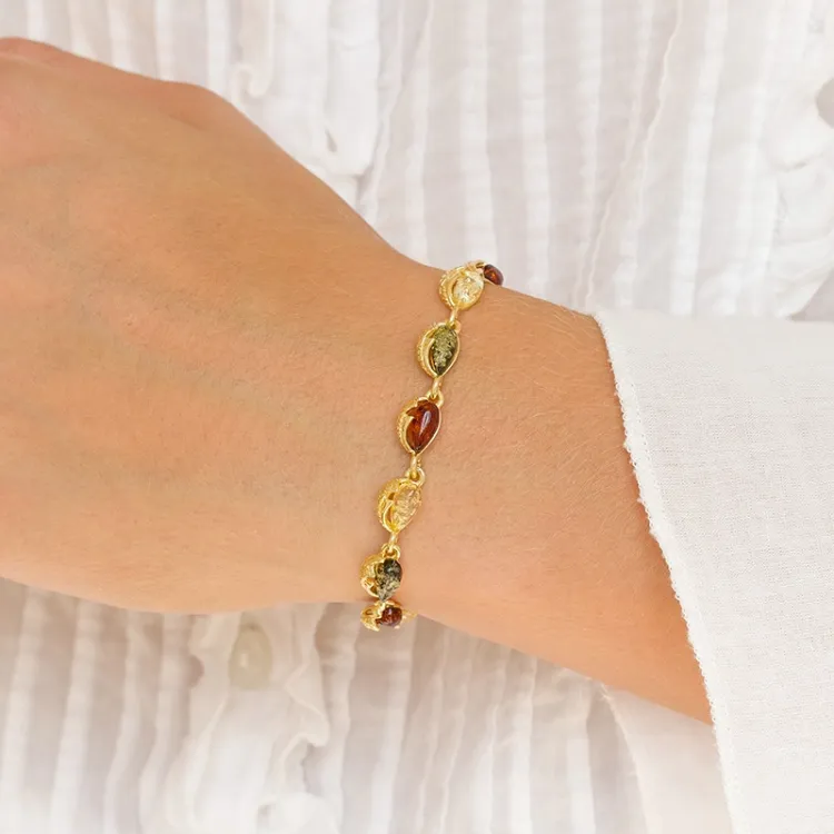 elegant multifärgat bärnsten armband i förgyllt silver