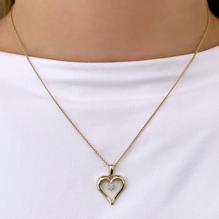 hjärta diamantberlocker i 9 carat guld 0,08 ct