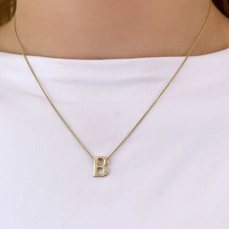 Bokstav b diamant hängen i 9 carat guld 0,01 ct
