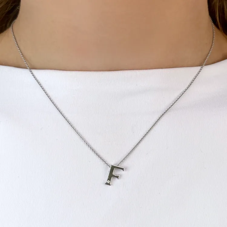 bokstav f diamant hängen i 9 carat vitguld 0,01 ct