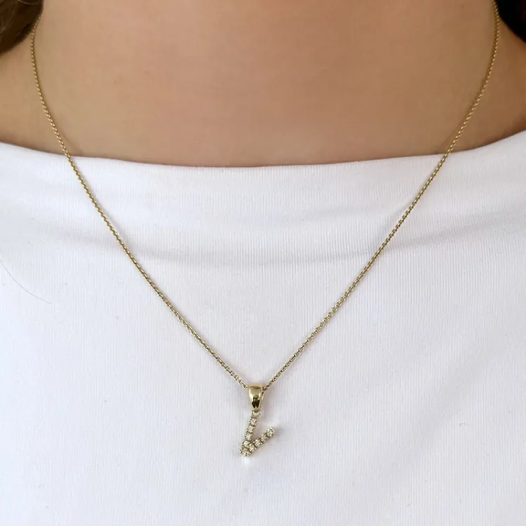 bokstav v diamant hängen i 9 carat guld 0,065 ct