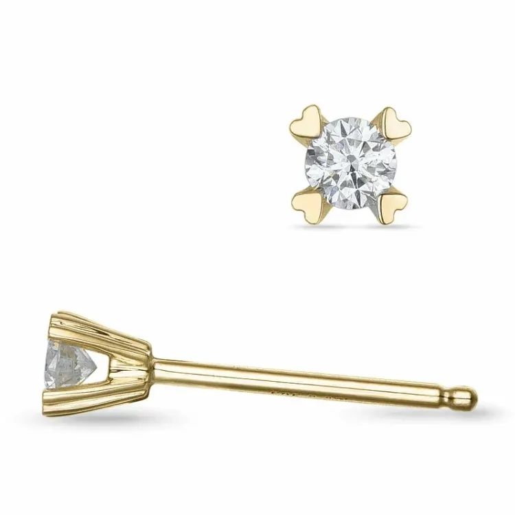 2 x 0,07 ct solitäreörhängestift i 9 karat guld med diamant 