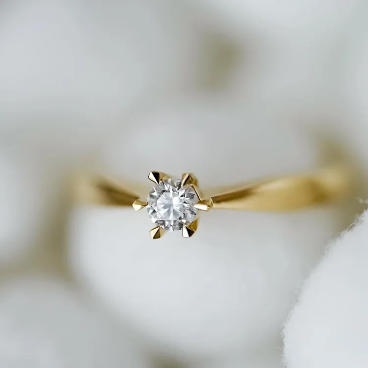 0,20 ct diamant solitärring i 14  karat guld 0,20 ct