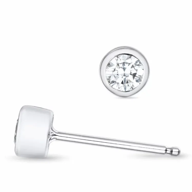 2 x 0,15 ct  kampajn -  solitäreörhängestift i 14 karat vitguld med diamant 