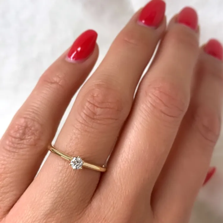 kampajn -  diamant solitärring i 14  karat guld 0,14 ct