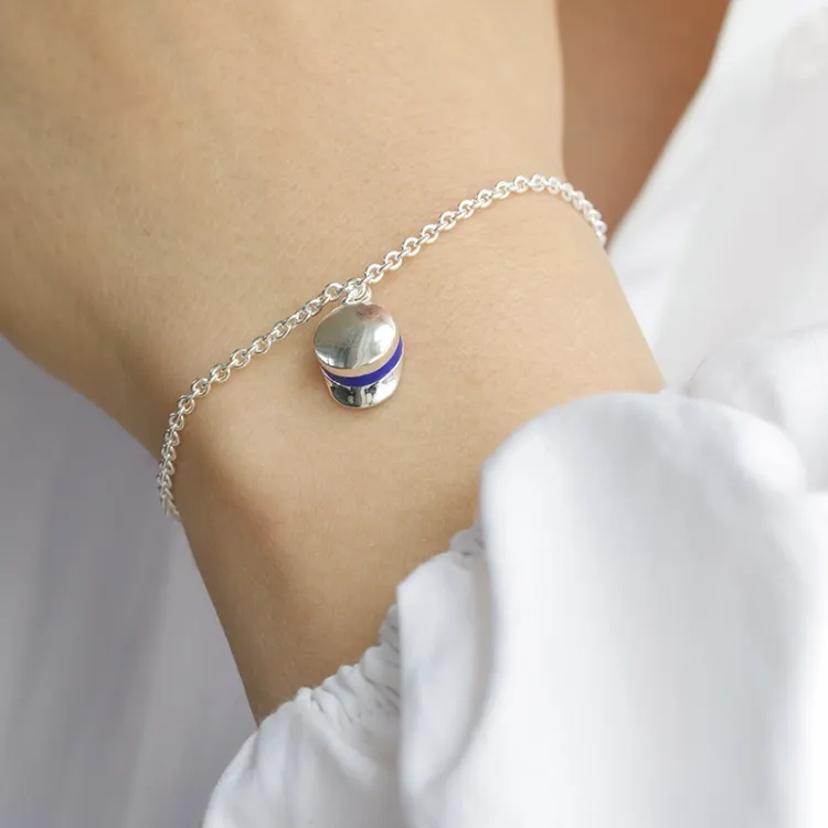 studentmössa blå armband i silver