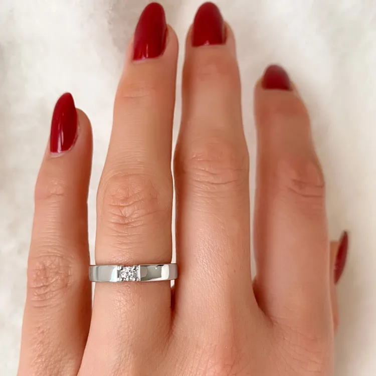 diamant alliancring i 14 karat vitguld 1 x 0,10 ct
