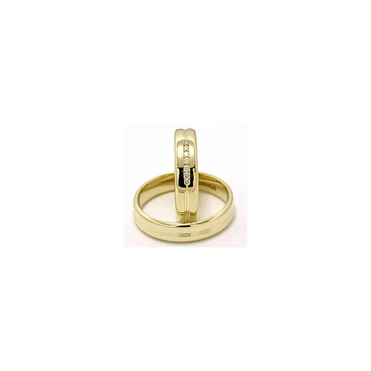 vigselsringar i 14  karat guld 0,091 ct - set