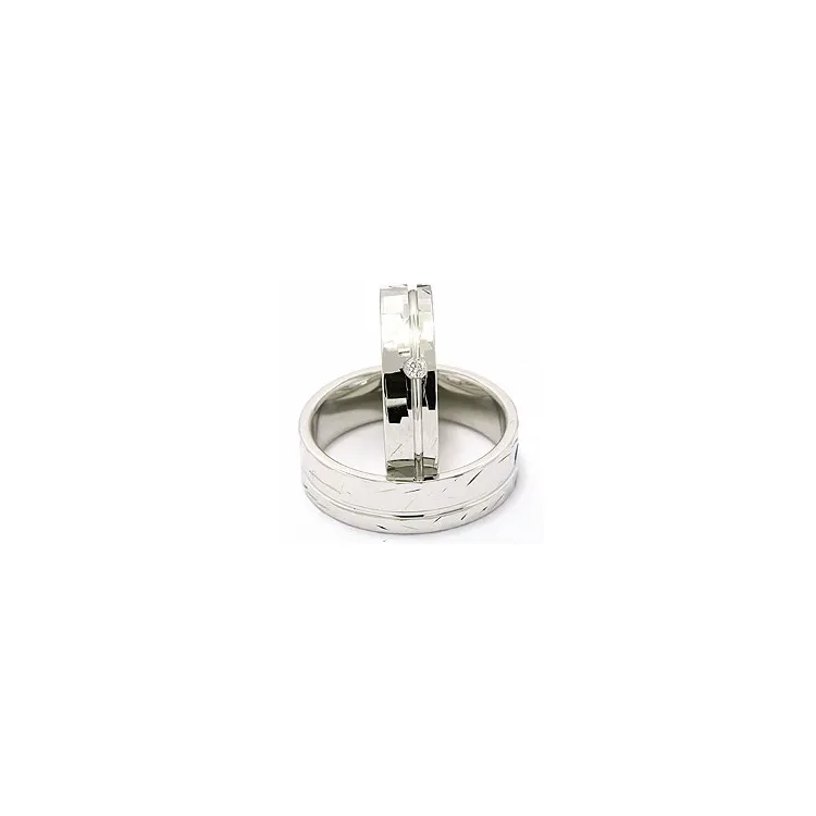 Strukturerad vigselsringar i 14  karat vitguld 0,03 ct - set