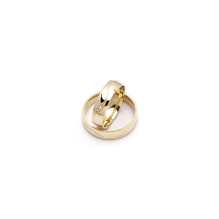 vigselsringar i 9 karat guld 0,036 ct - set
