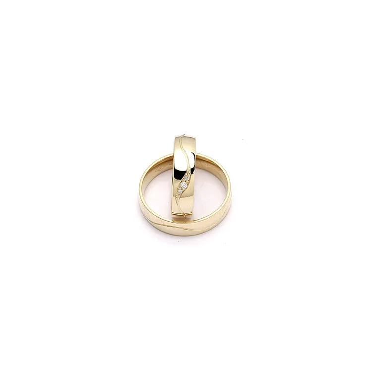 vigselsringar i 9 karat guld 0,036 ct - set