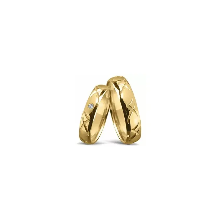 mönster vigselsringar i 14  karat guld 0,025 ct - set