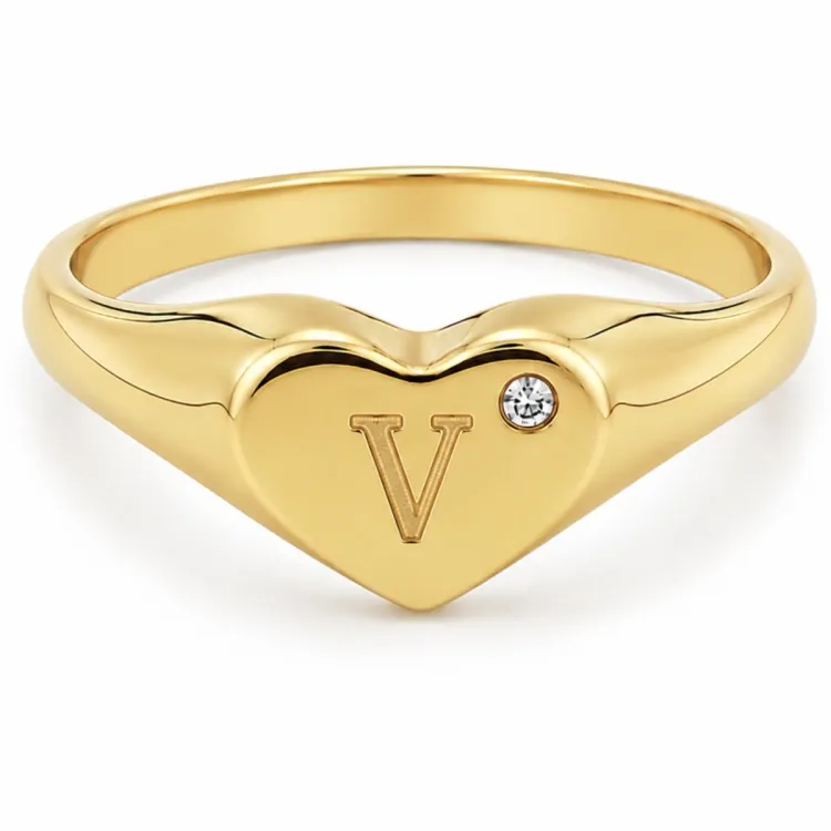 bokstav v zirkon ring i förgylld mässing