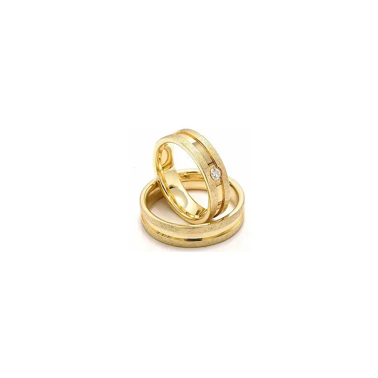 Vigselsringar i 14  karat guld 0,07 ct - set
