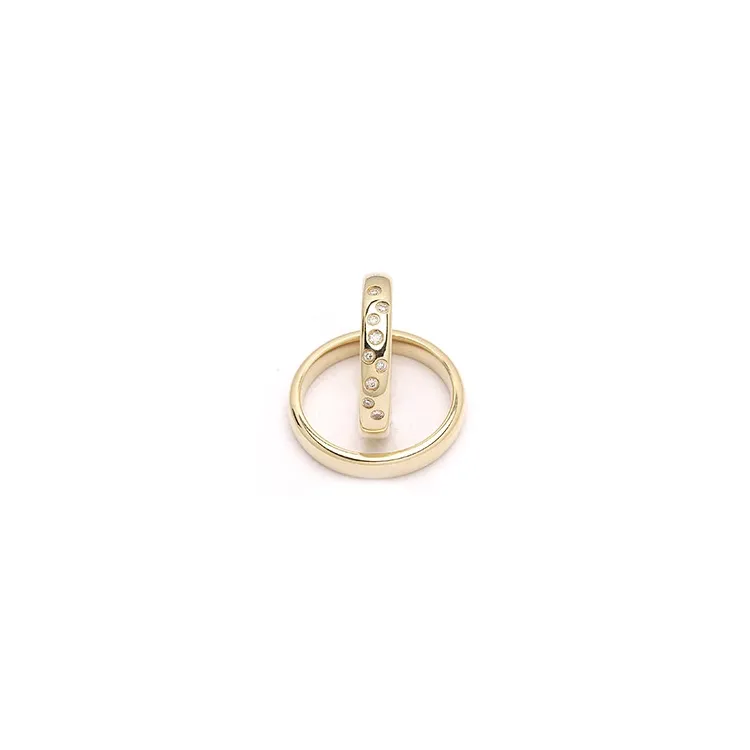 stjärnskimmer vigselsringar i 9 karat guld 0,126 ct - set