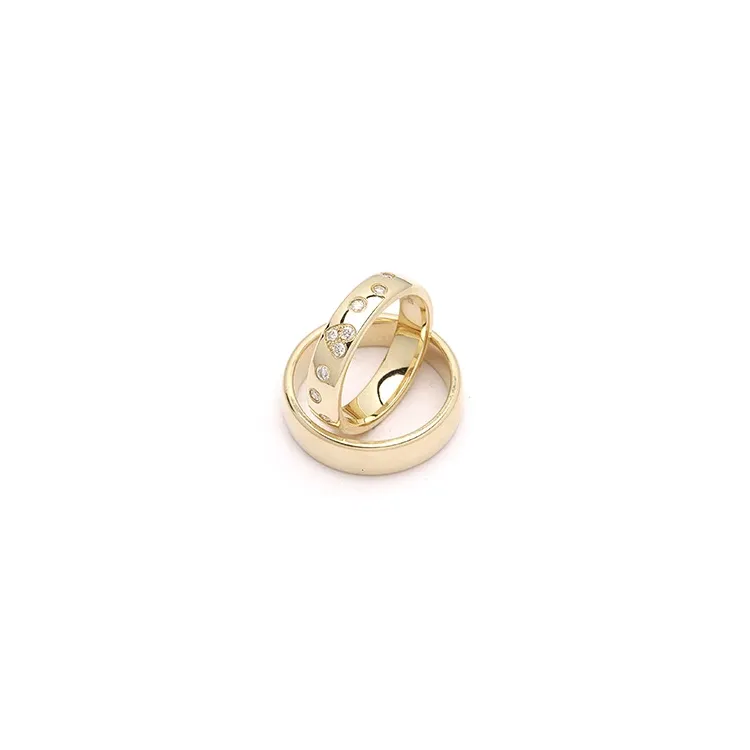 hjärta vigselsringar i 9 karat guld 0,225 ct - set
