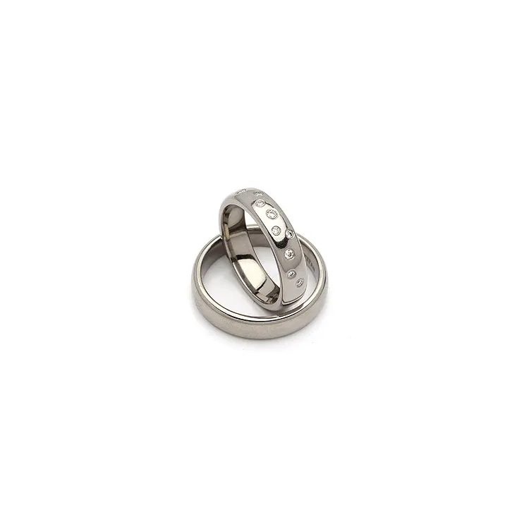 Vigselsringar i titan 0,126 ct