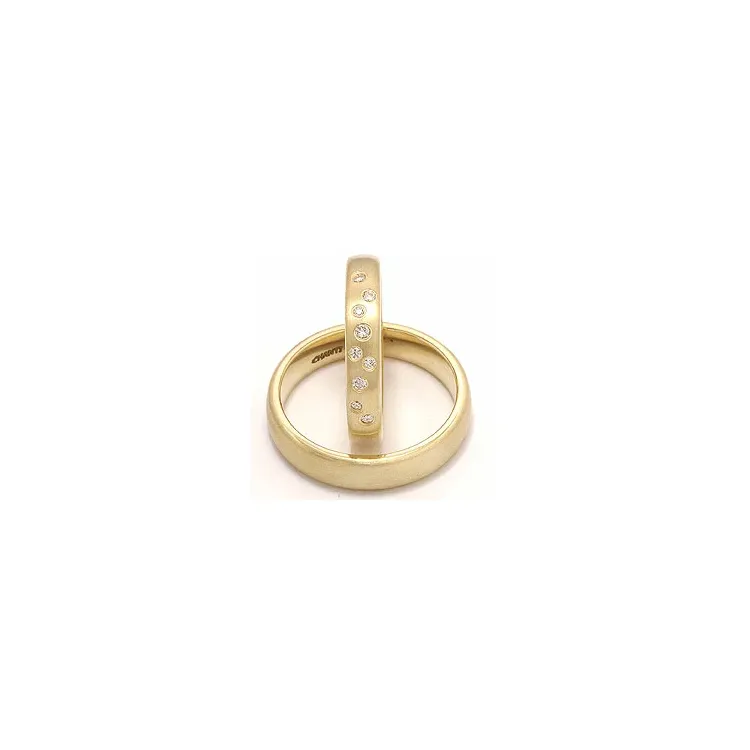 Vigselsringar i 14  karat guld 0,126 ct - set
