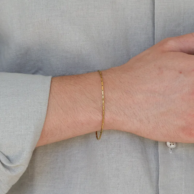 vattentät armband i förgyllt stål  x 1,5 mm 