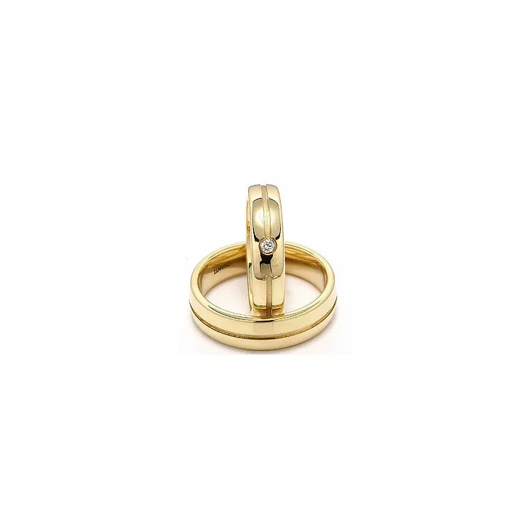 Vigselsringar i 14  karat guld 0,04 ct - set