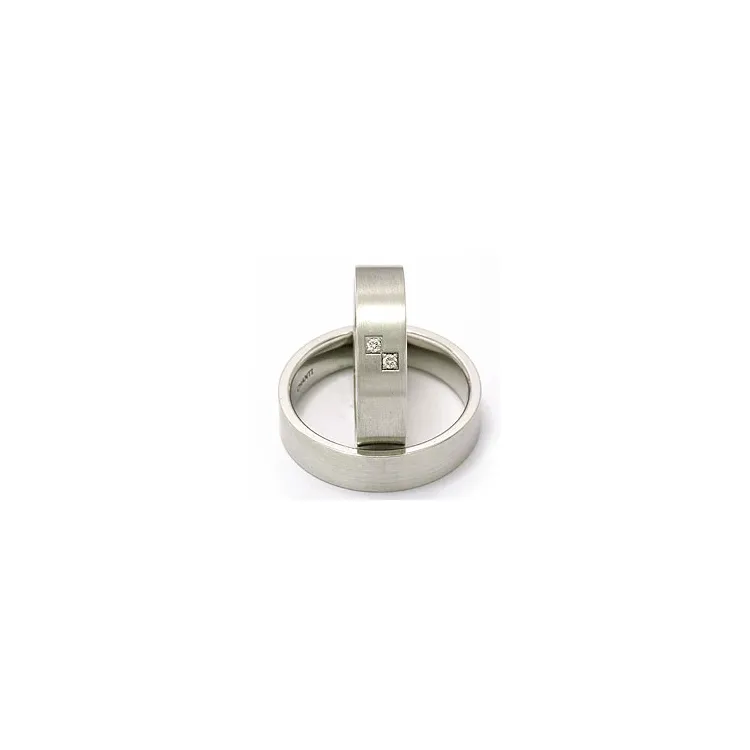 Vigselsringar i 14  karat vitguld 2 x 0,015 ct - set