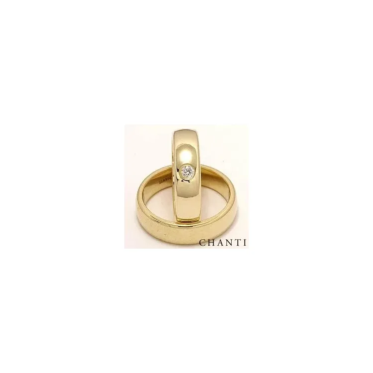 Bredd ovala vigselsringar i 14  karat guld 0,10 ct - set