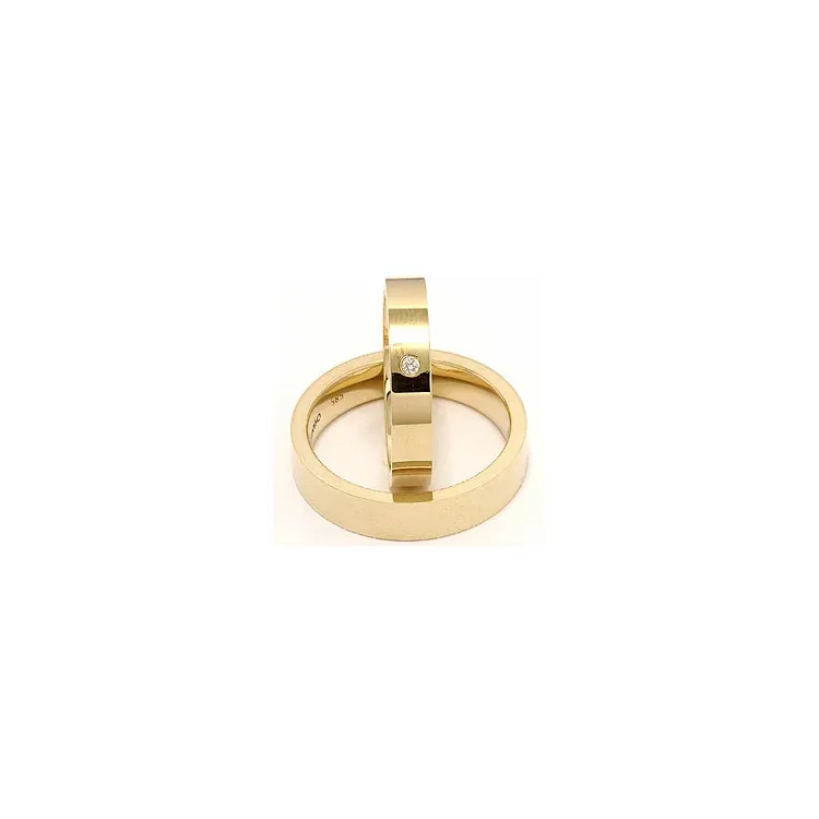 Vigselsringar i 14  karat guld 0,025 ct - set