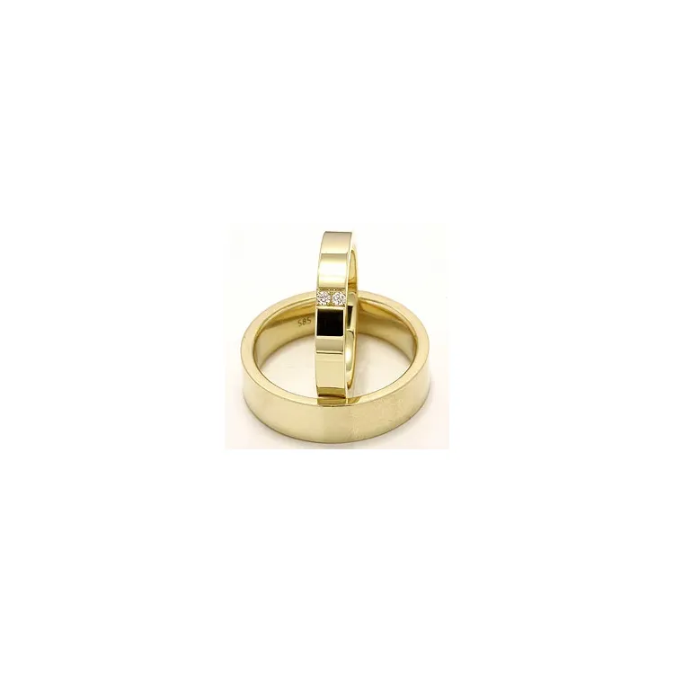 Vigselsringar i 14  karat guld 2 x 0,018 ct - set
