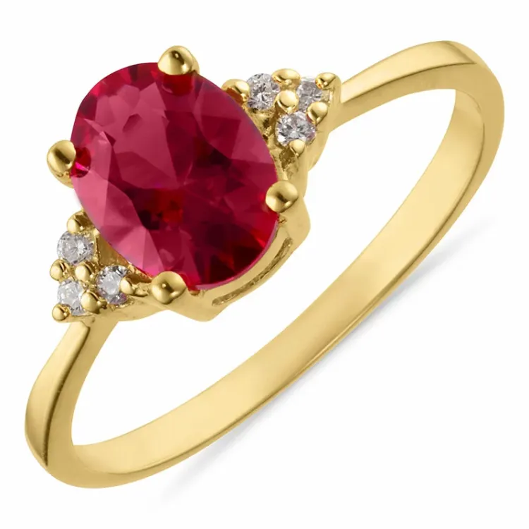 oval röd syntetisk rubin ring i förgyllt silver