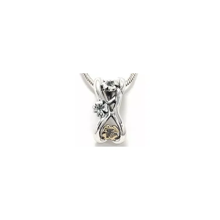 Blommaberlock i oxiderat sterlingsilver och 8 karat guld