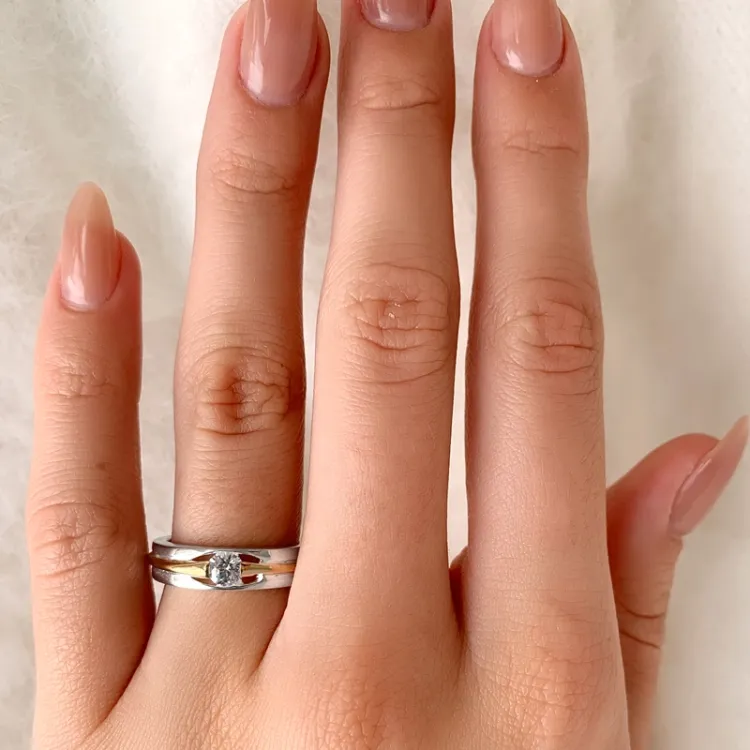 äkta  ring i silver med 8 karat guld