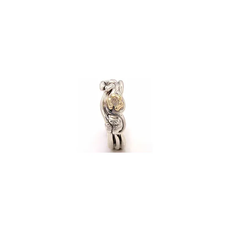Blommor ring i oxiderat sterlingsilver med 8 karat guld