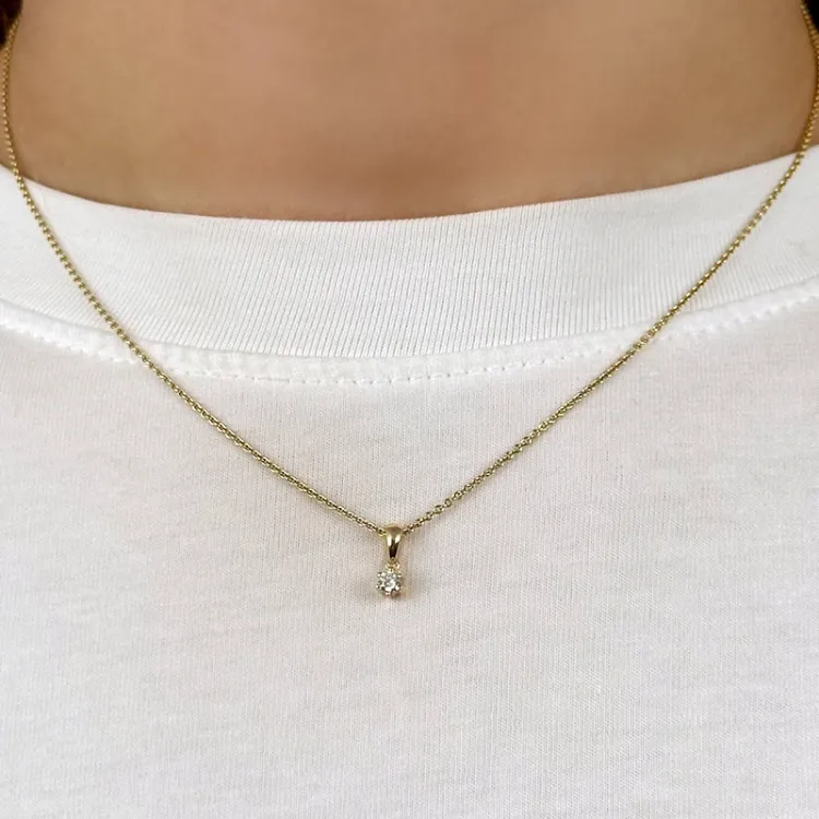 diamant solitärberlock i 14  carat guld 0,10 ct