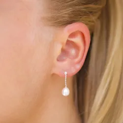 långa pärla örhängen i silver