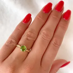 grön peridot solitärring i 14  karat guld 1,27 ct