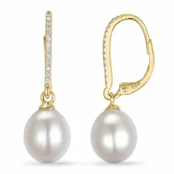 långa pärla creol i 14 karat guld med diamant 