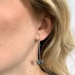 långa fjärilar kedja örhängen i silver