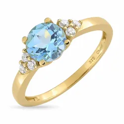 ljusblå topas ring i 9 karat guld