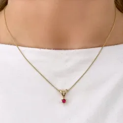 äkta  rubin hängen i 14  carat guld 0,30 ct