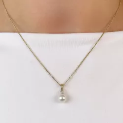 pärla diamantberlocker i 14  carat guld 0,05 ct