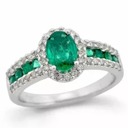 oval grön smaragd diamantring i 14  karat vitguld 0,65 ct 0,31 ct 0,29 ct